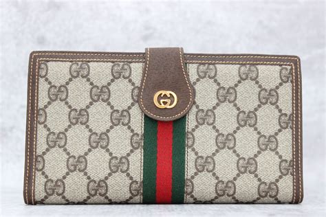 vintage gucci wallet brown|Gucci signature wallet brown.